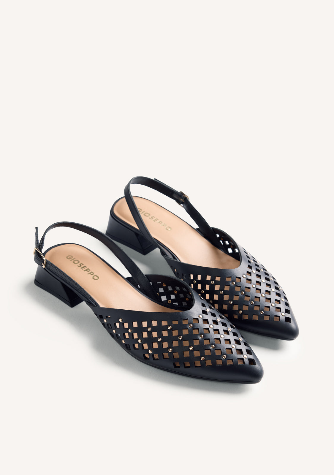 CUT-OUT AND STUDDED LEATHER HEELED SHOES LAGOS