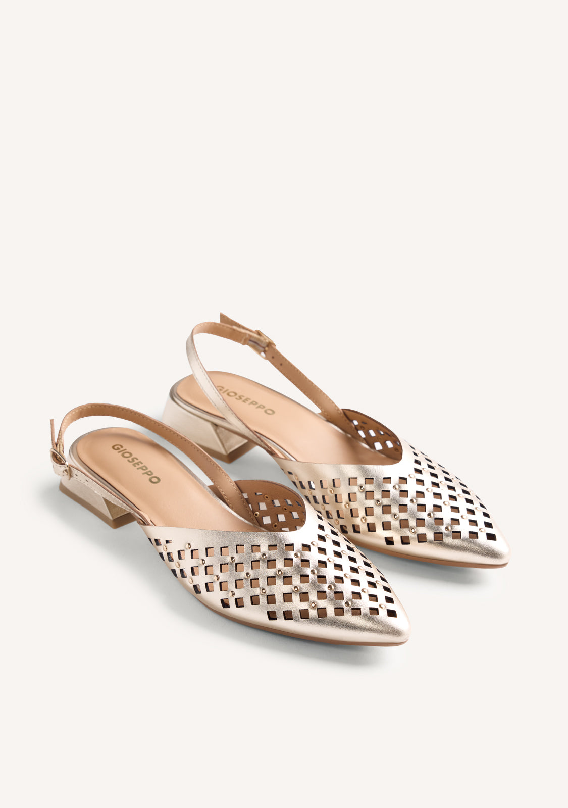 CUT-OUT AND STUDDED LEATHER HEELED SHOES LAGOS