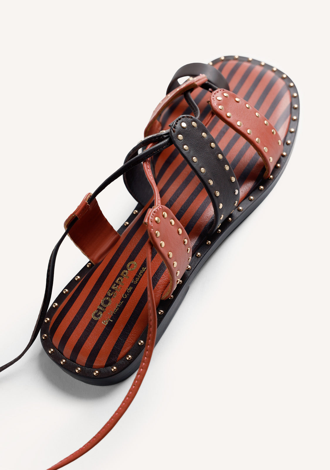 LEATHER SANDALS WITH STUDS BY MARÍA G. DE JAIME