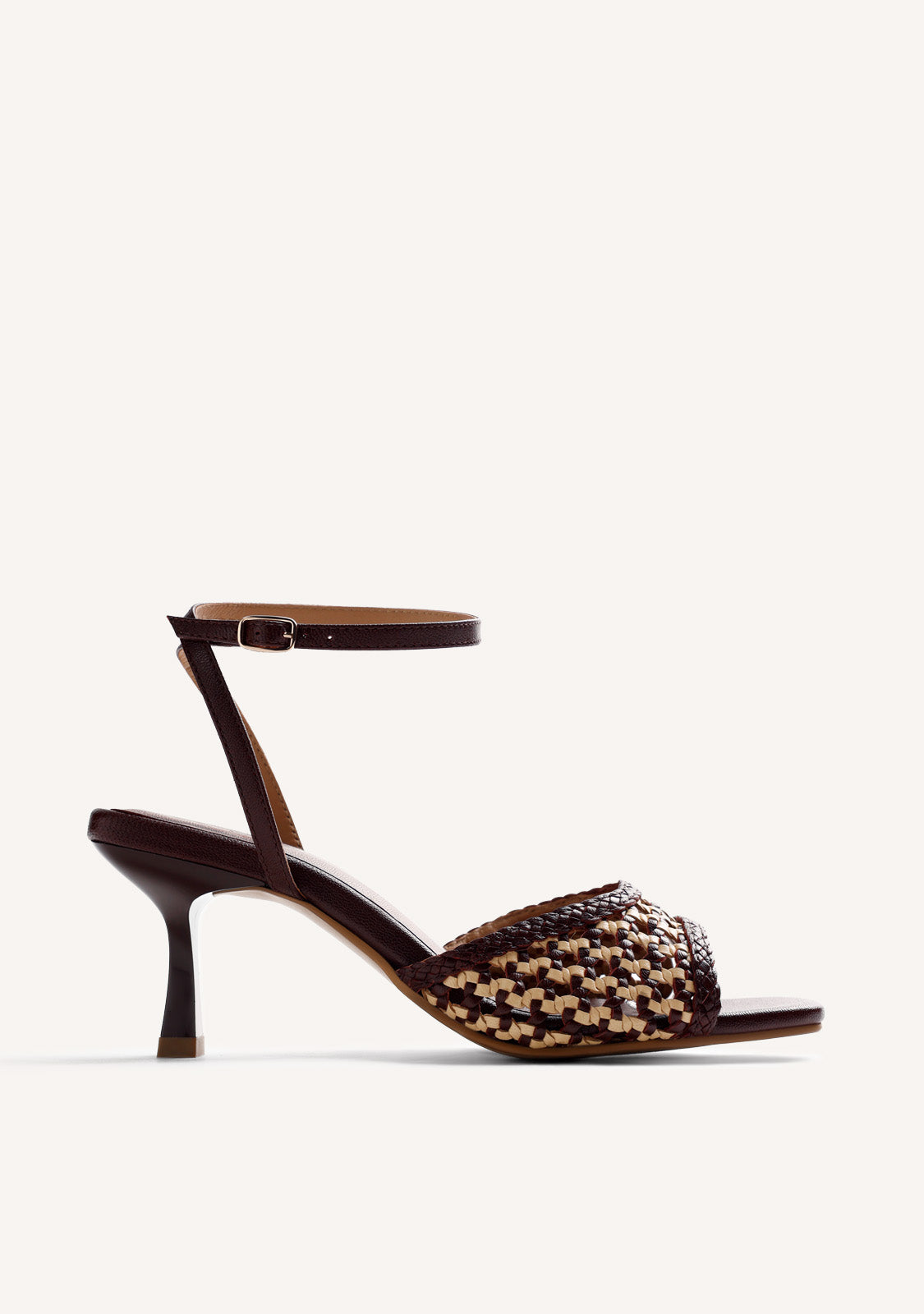BRAIDED LEATHER HEELED SANDALS BY MARÍA G. DE JAIME