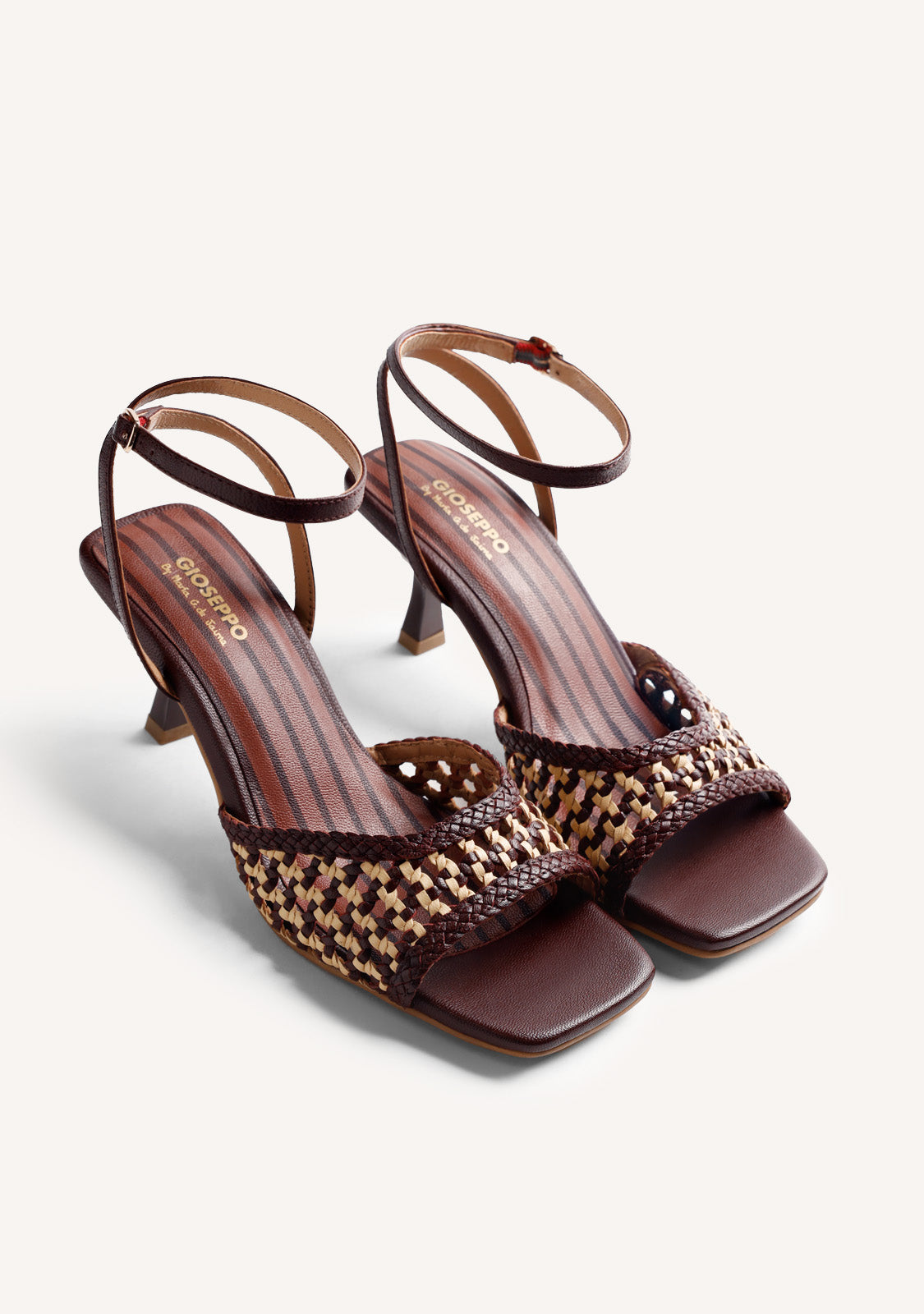 BRAIDED LEATHER HEELED SANDALS BY MARÍA G. DE JAIME