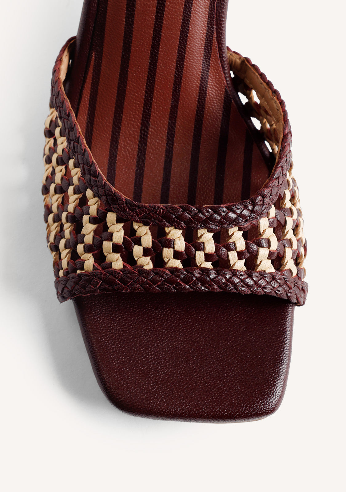 BRAIDED LEATHER HEELED SANDALS BY MARÍA G. DE JAIME