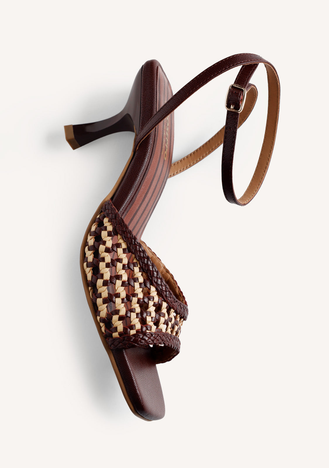BRAIDED LEATHER HEELED SANDALS BY MARÍA G. DE JAIME