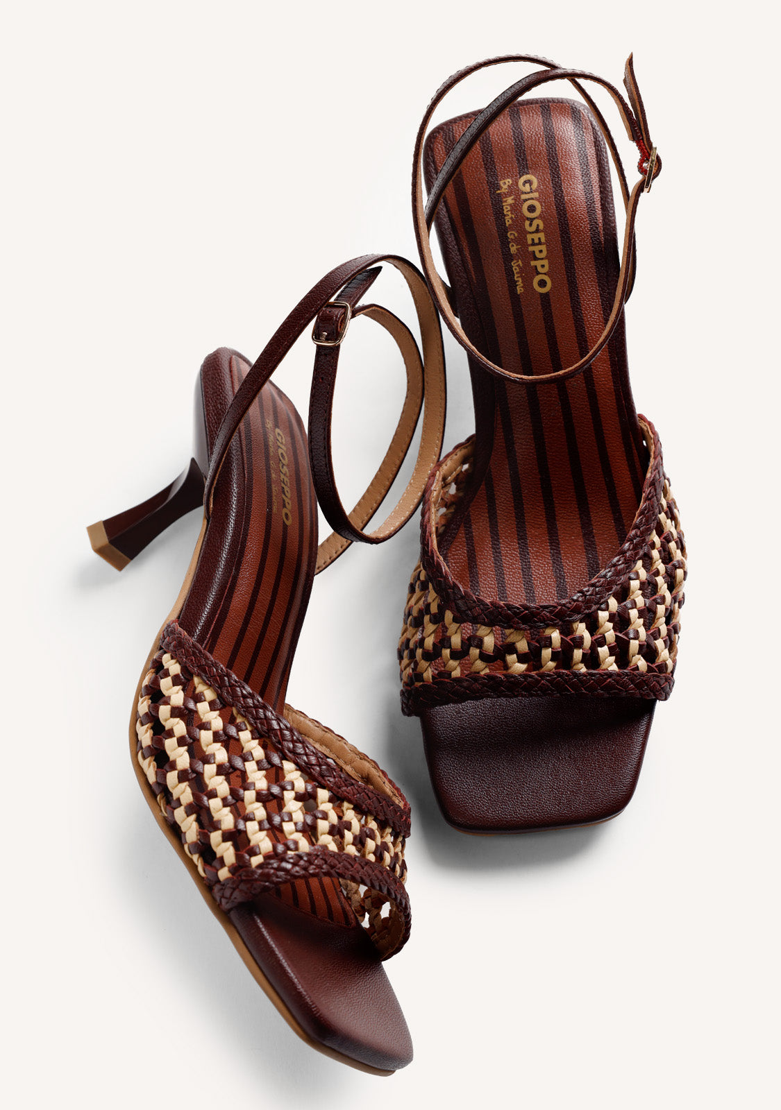 BRAIDED LEATHER HEELED SANDALS BY MARÍA G. DE JAIME