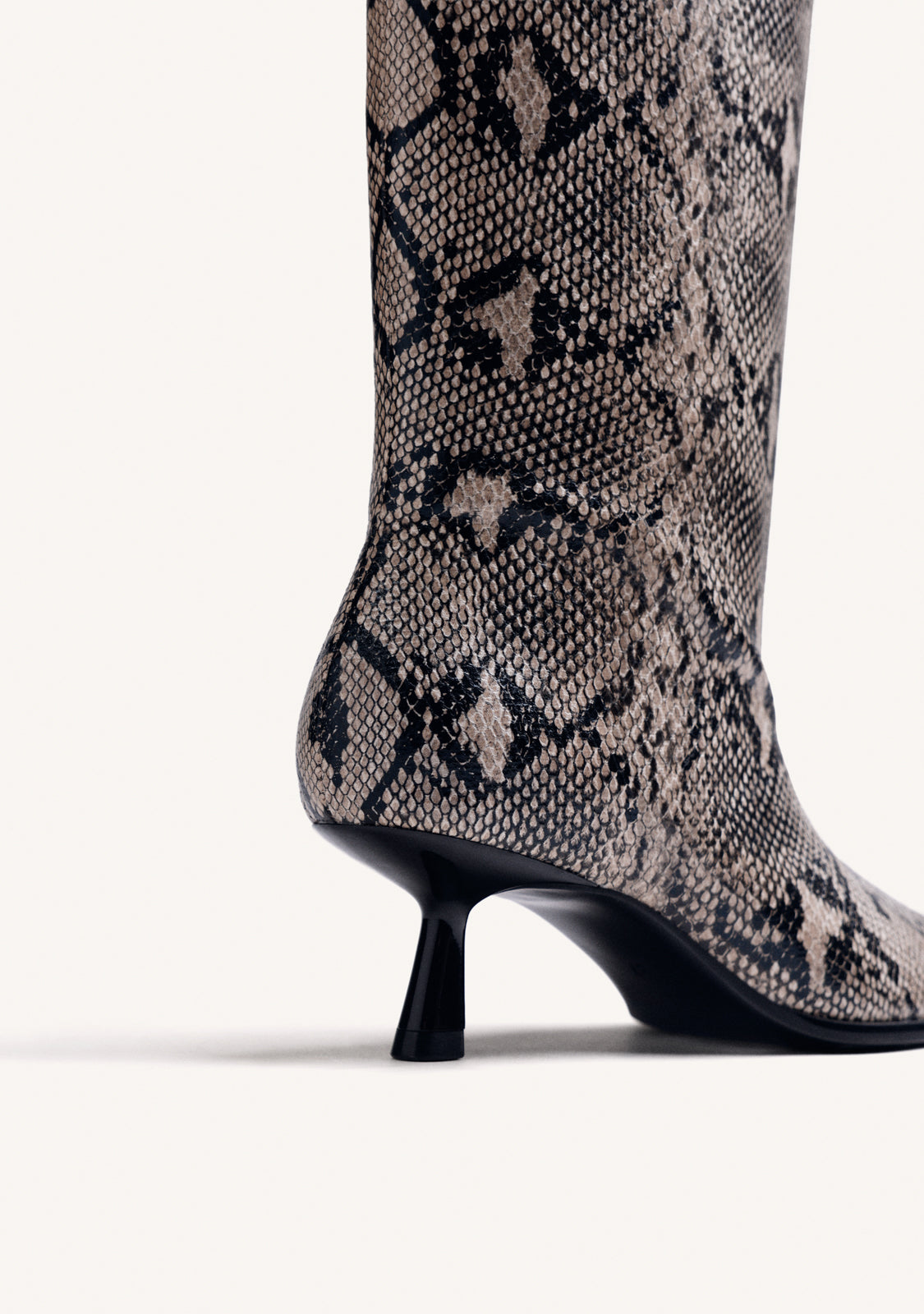 HIGH ANIMAL PRINT KITTEN BOOTS