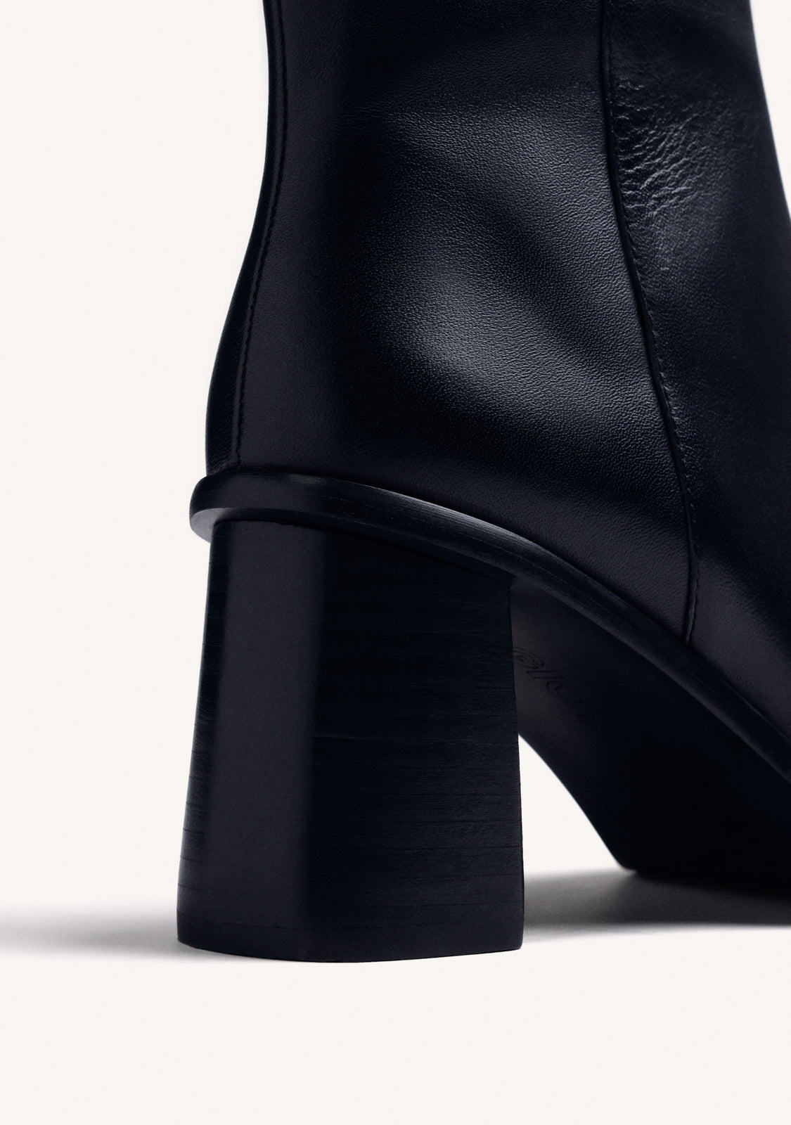 BLACK LEATHER ANKLE BOOTS WITH STUDS