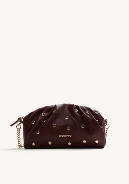 BORSA A TRACOLLA BORDEAUX EFFETTO STROPPIATO CON BORCHIE