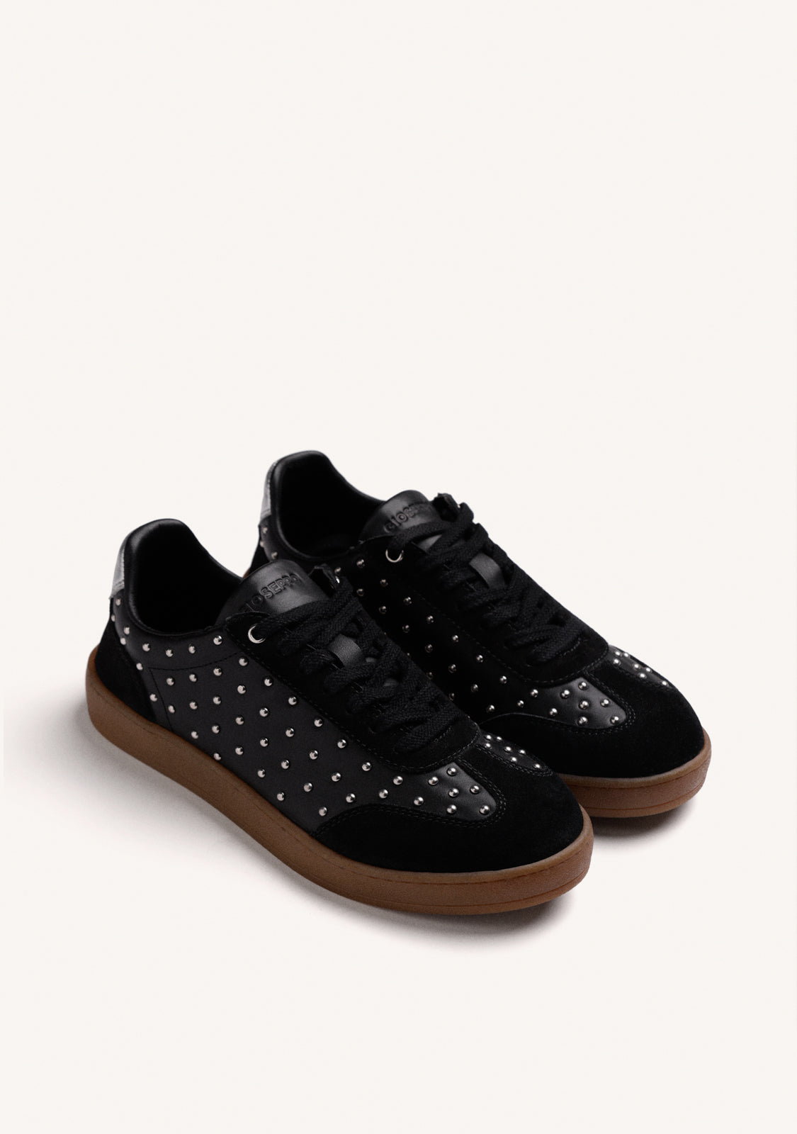 SCARPE DA GINNASTICA NERE IN PELLE CON BORCHIE