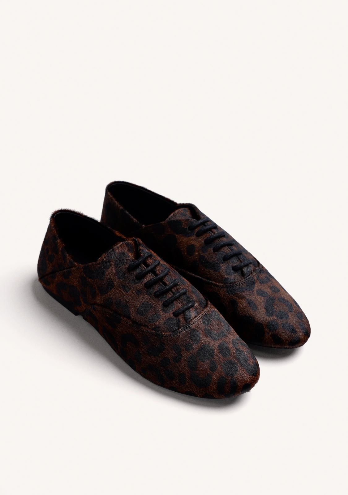 FLAT SHOES WITH ANIMAL PRINT LEATHER
