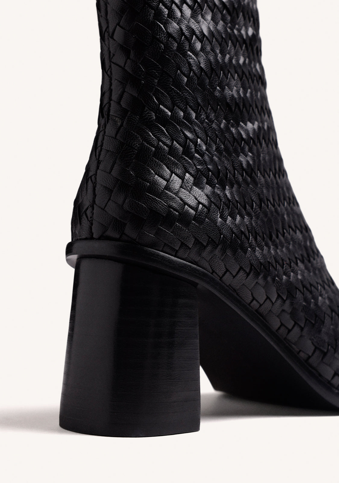 BLACK WOVEN LEATHER ANKLE BOOTS