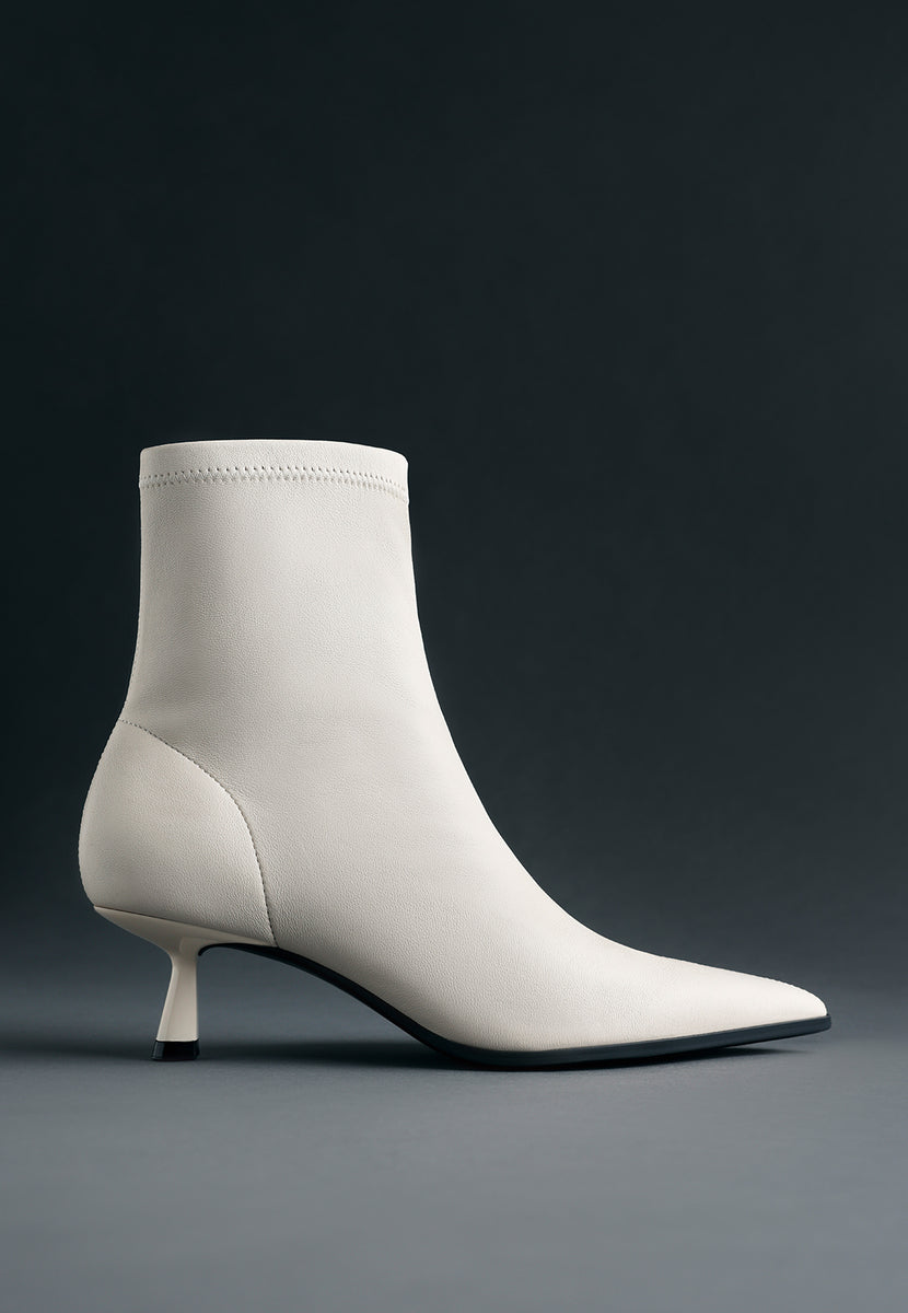 OFF-WHITE LEATHER ELASTIC ANKLE BOOTS BY MELYSSA PINTO