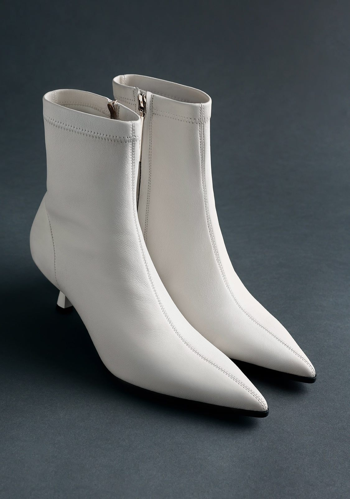 OFF-WHITE LEATHER ELASTIC ANKLE BOOTS BY MELYSSA PINTO