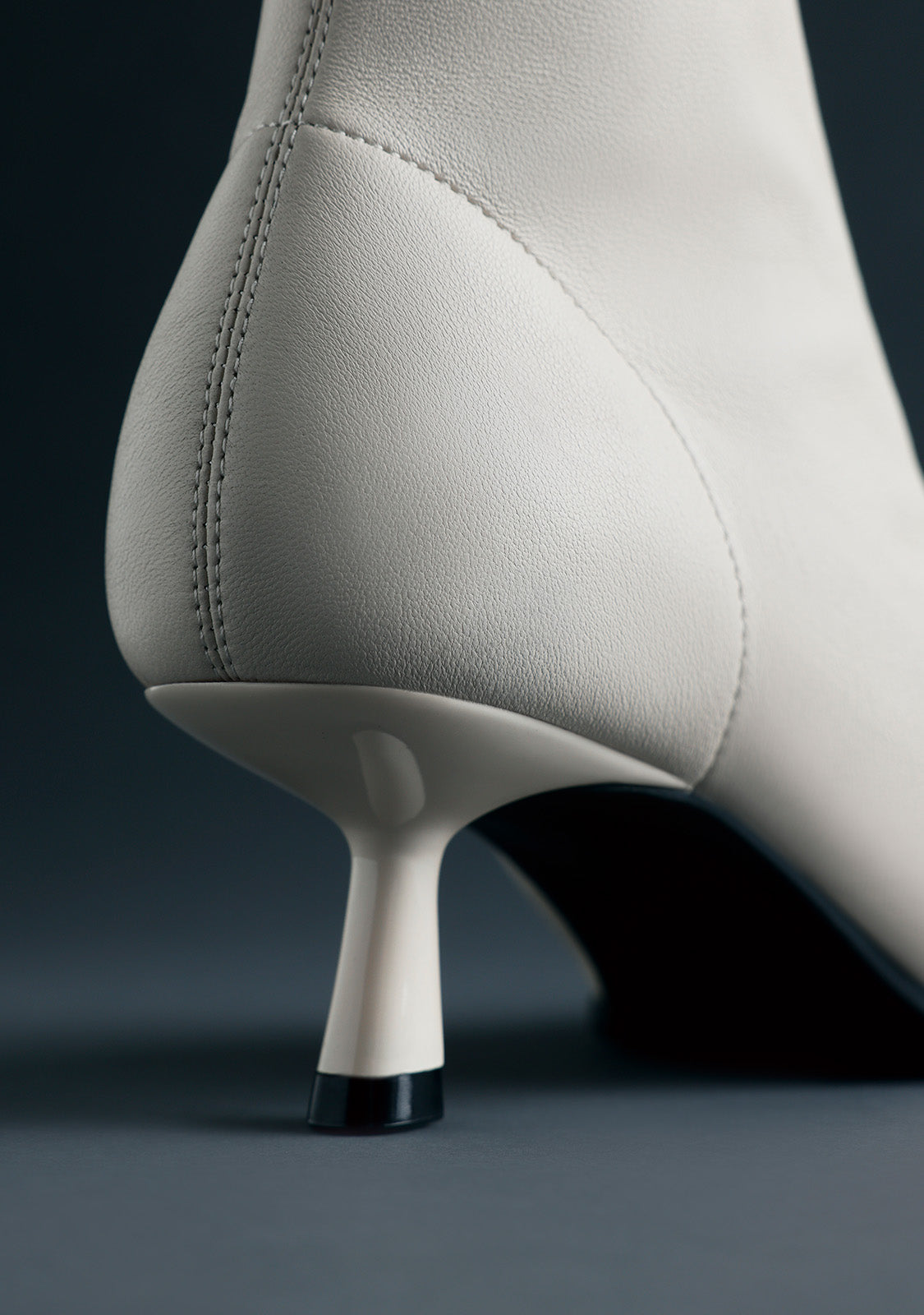 OFF-WHITE LEATHER ELASTIC ANKLE BOOTS BY MELYSSA PINTO