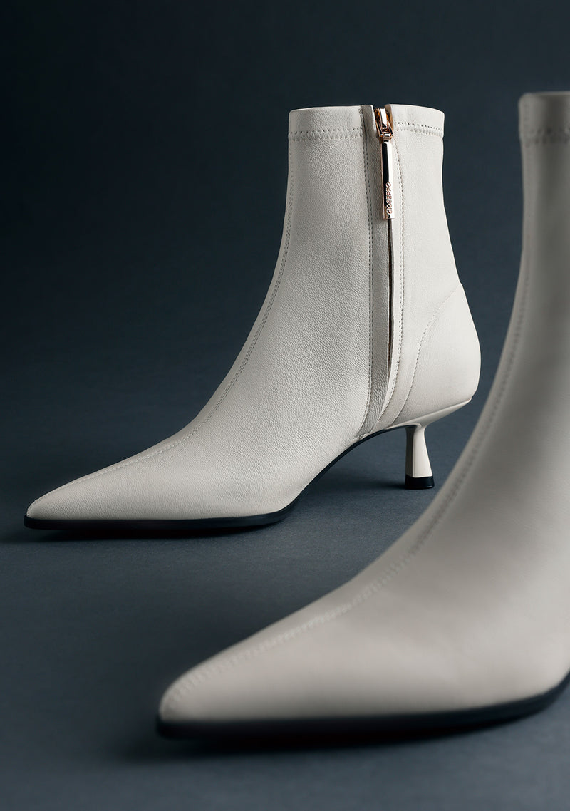 OFF-WHITE LEATHER ELASTIC ANKLE BOOTS BY MELYSSA PINTO